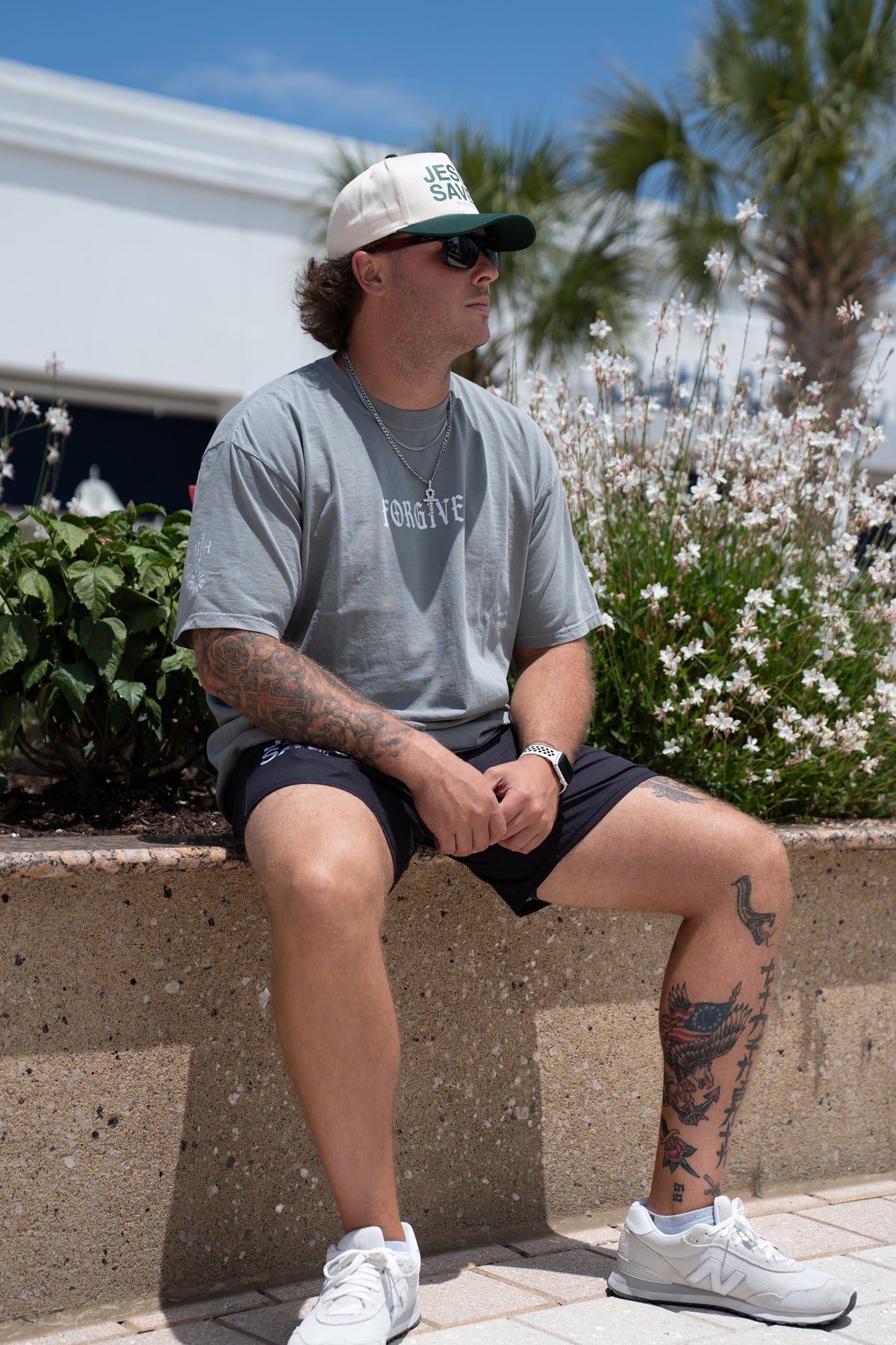 Gray premium tee with small chest FORGIVEN text graphic, crew neck short sleeves