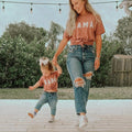 Dusty rose toddler T-shirt with white "BABE" graphic
