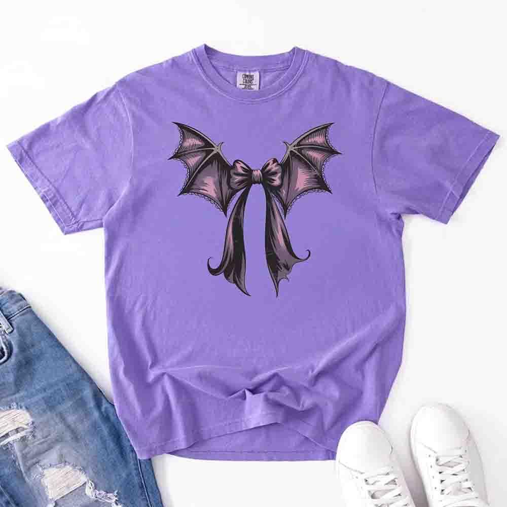 Purple short-sleeve Halloween T-shirt with black bat bow wing graphic front