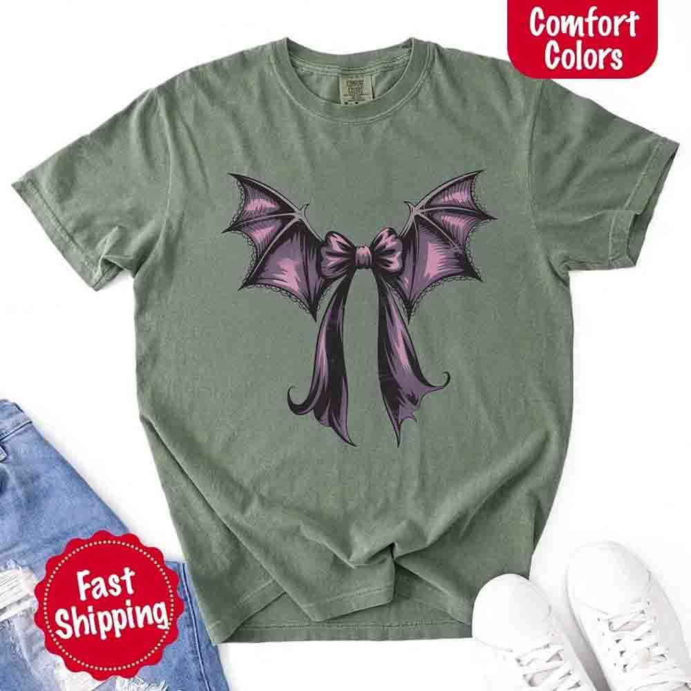Moss green Halloween T-shirt with black and purple bat bow graphic at center