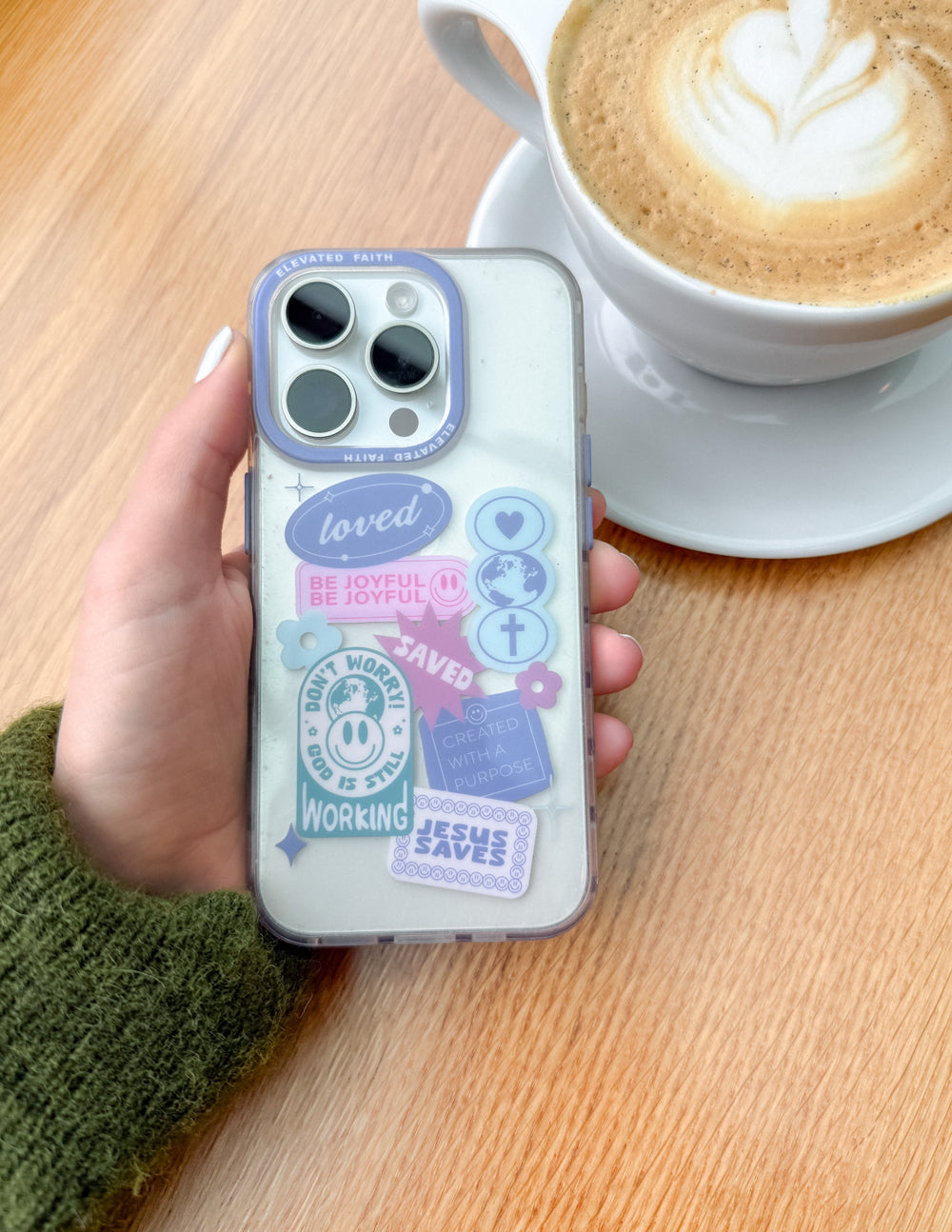 Translucent light-blue phone case with heart icons and 'Be joyful' quote