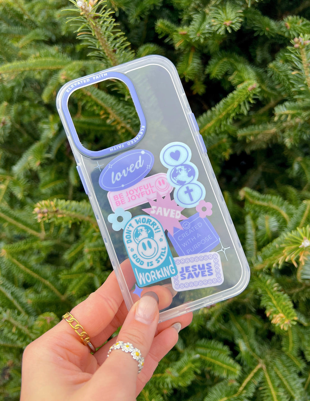 Translucent light-blue phone case with heart icons and 'Working Jesus' text