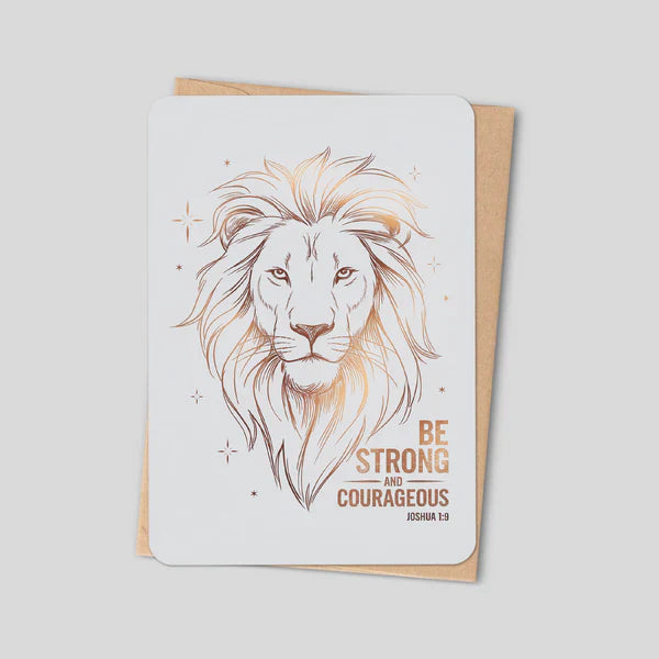 Christian encouragement card with lion art, “Be strong and courageous”, tucked in kraft envelope