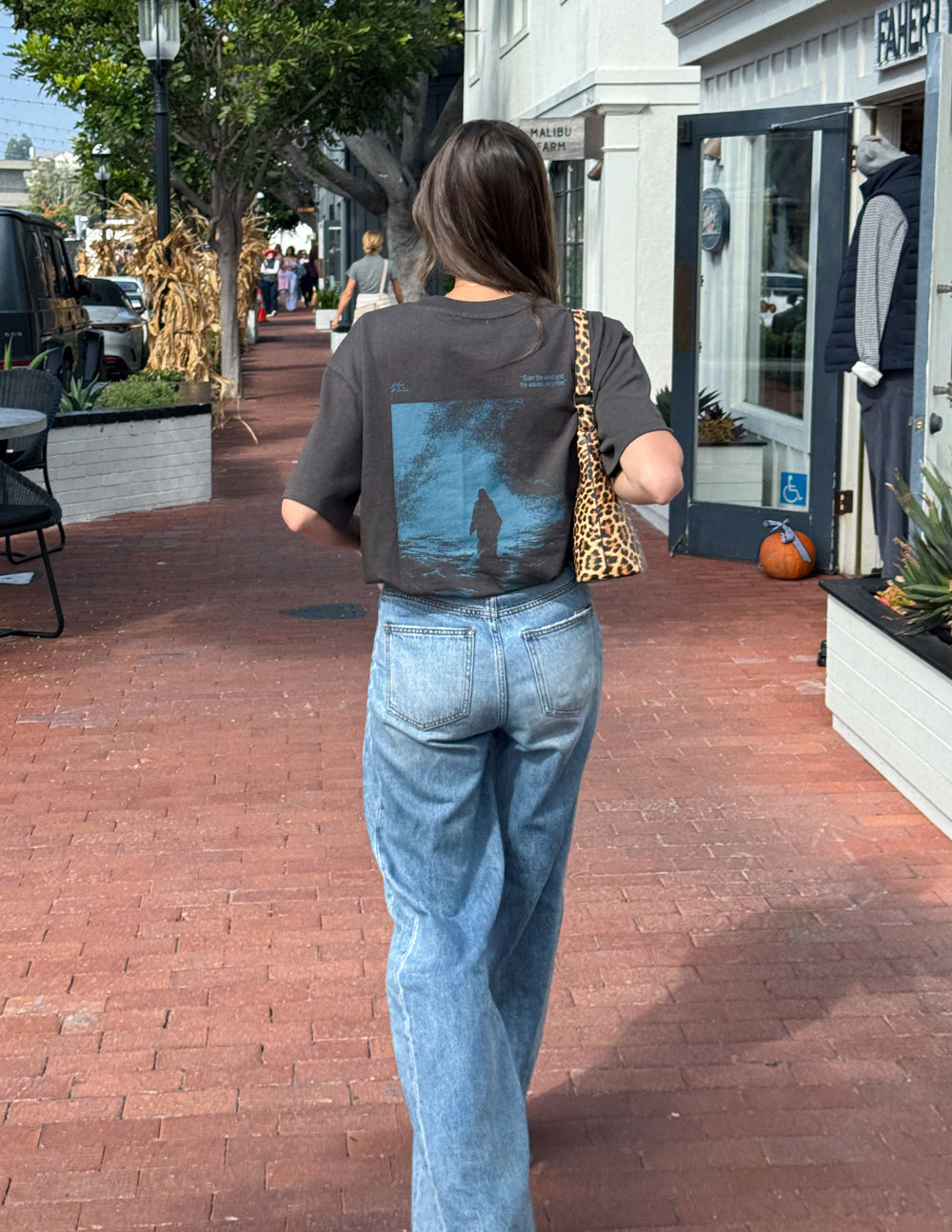 Dark gray T-shirt with blue back graphic and short sleeves