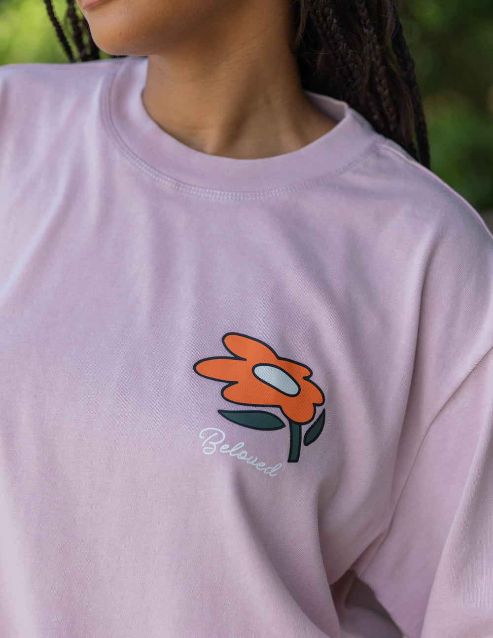 Light purple long-sleeve tee with orange flower and 'Beloved' script detail