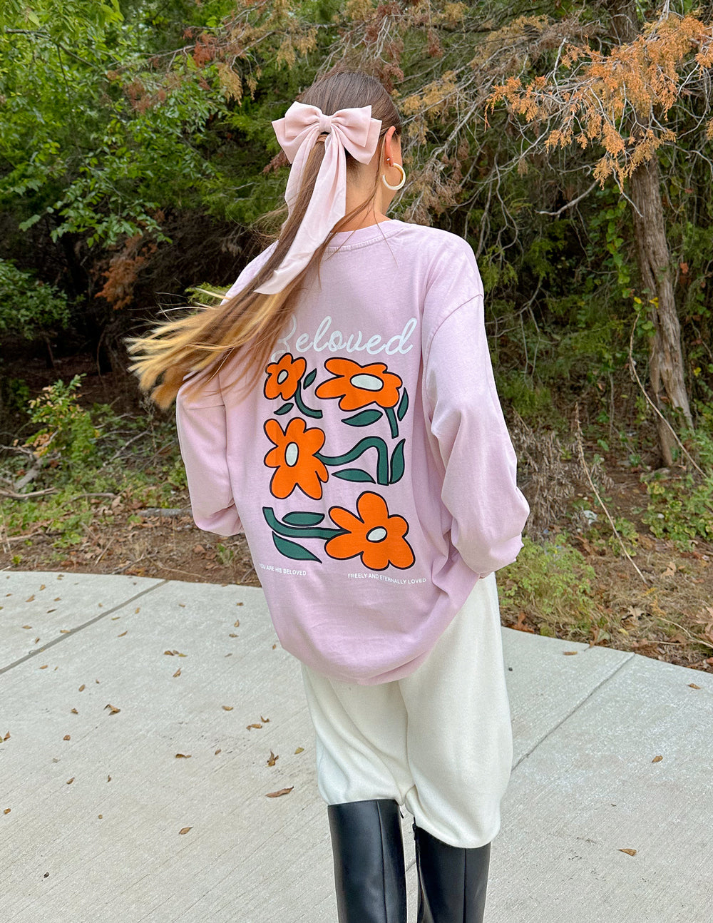 Light purple long-sleeve unisex tee with large orange flower graphic on back