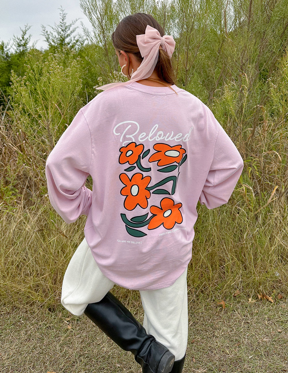 Light purple long-sleeve unisex tee with 'Beloved' back print and orange flowers