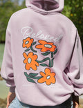 Lilac unisex hoodie, back floral graphic with 'Beloved' lettering