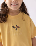 Kids graphic T-shirt in mustard yellow with butterfly print on chest