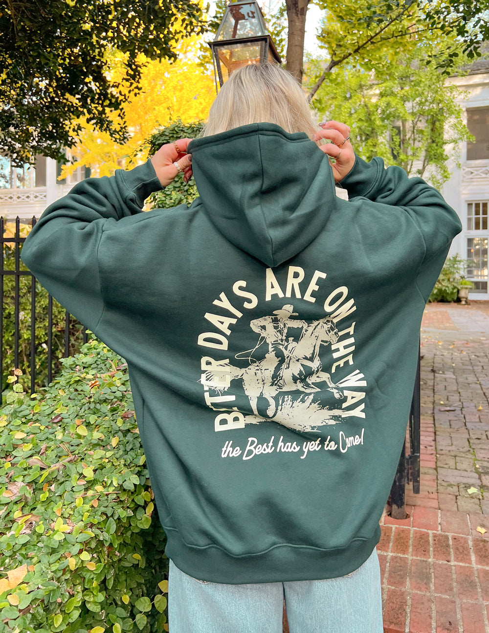 Dark green unisex hoodie with large back 'Better Days' graphic and hood