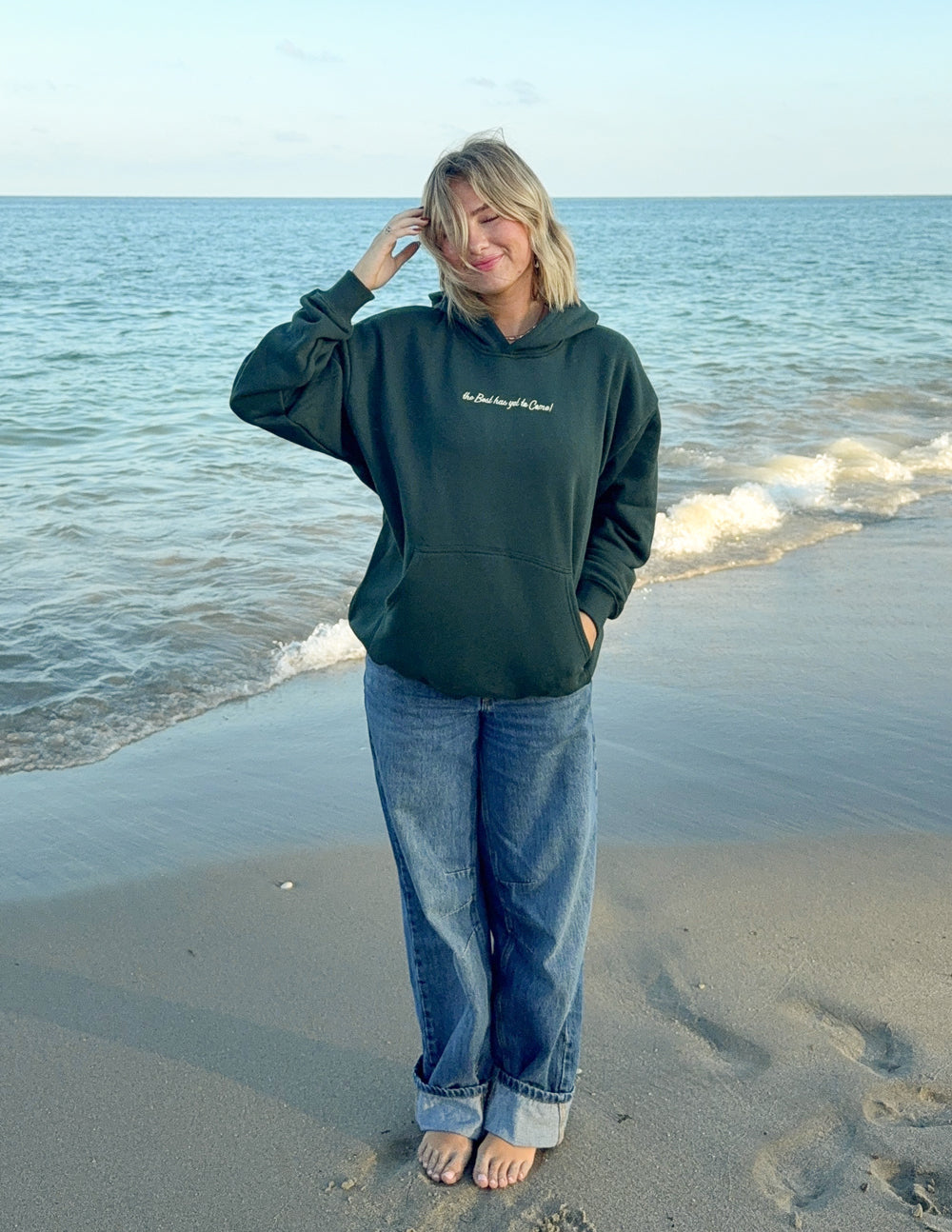 Dark green unisex hoodie with hood and front pouch pocket