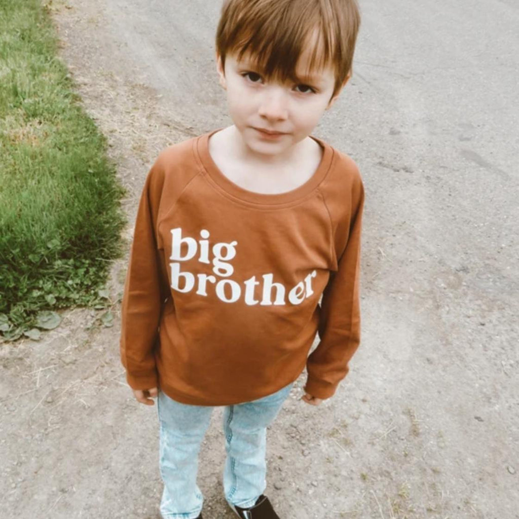 Children’s organic cotton pullover, rust-brown, long sleeves with printed “big brother” logo