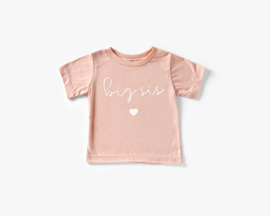 Baby and toddler big sis T-shirt, light pink with cursive text and heart