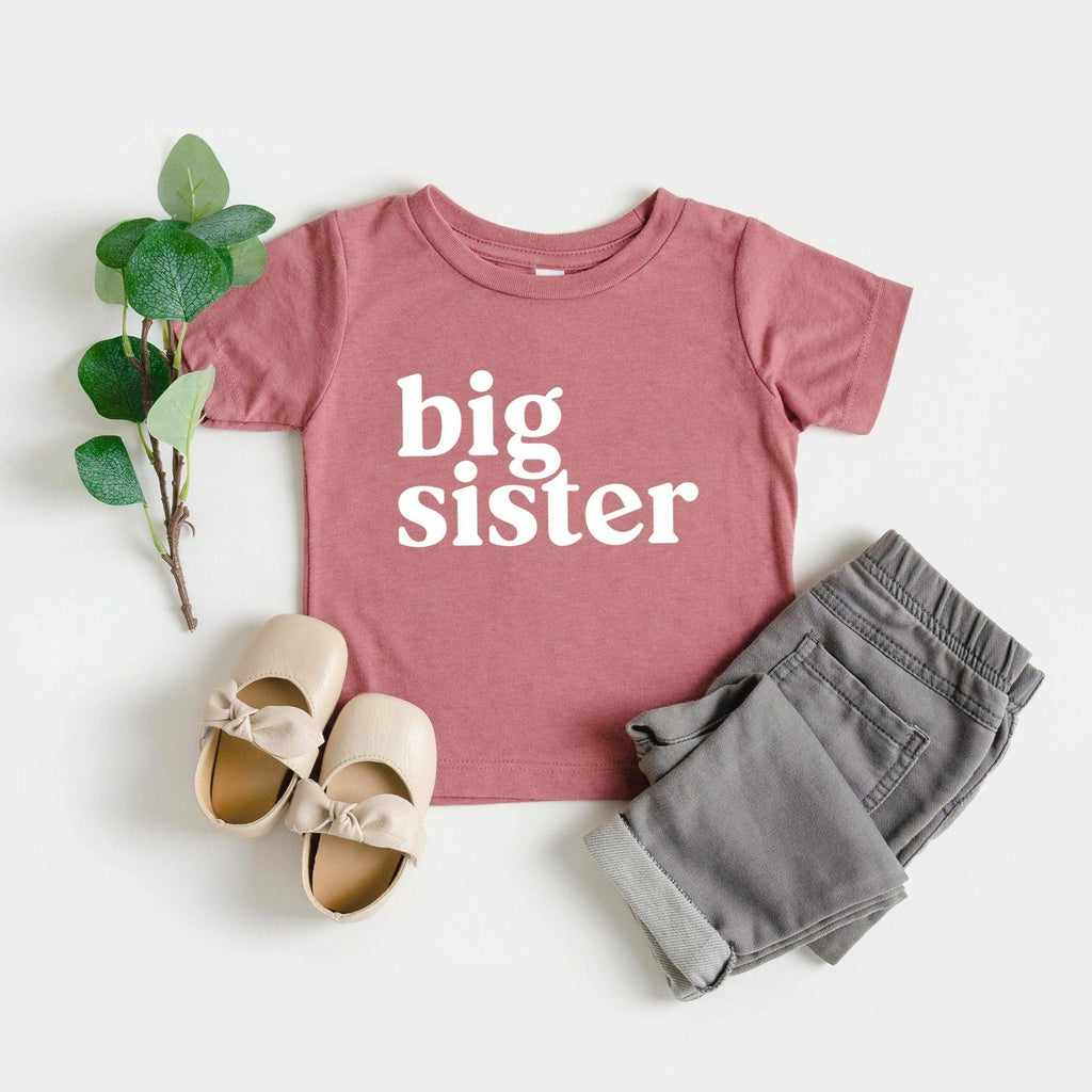 Pink toddler T-shirt with 'big sister' serif print