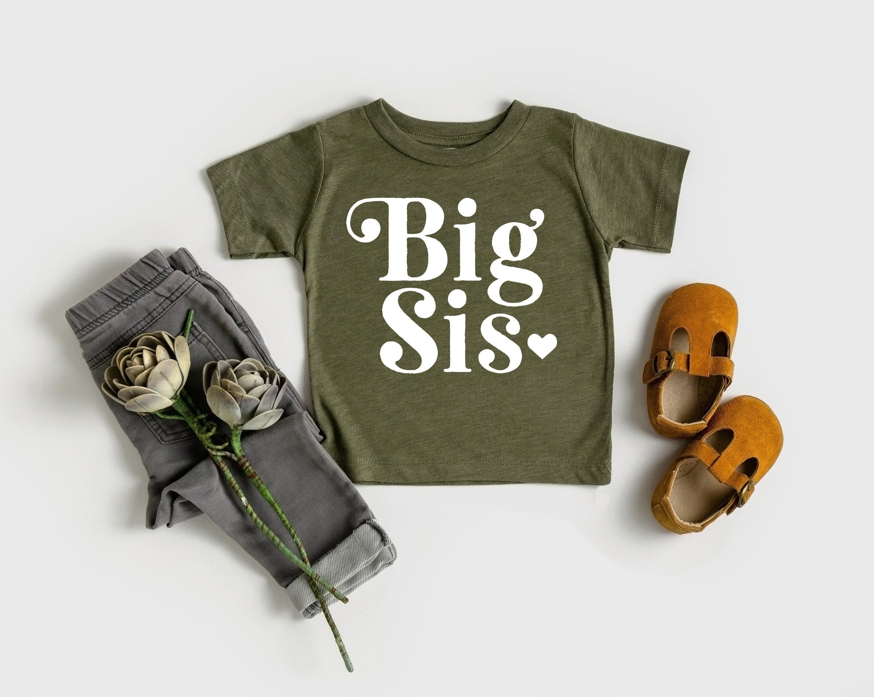 Olive green toddler T-shirt with Big Sis heart retro graphic and crew neck