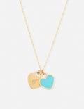 Gold chain necklace with blue enamel heart pendant and small engraved charm