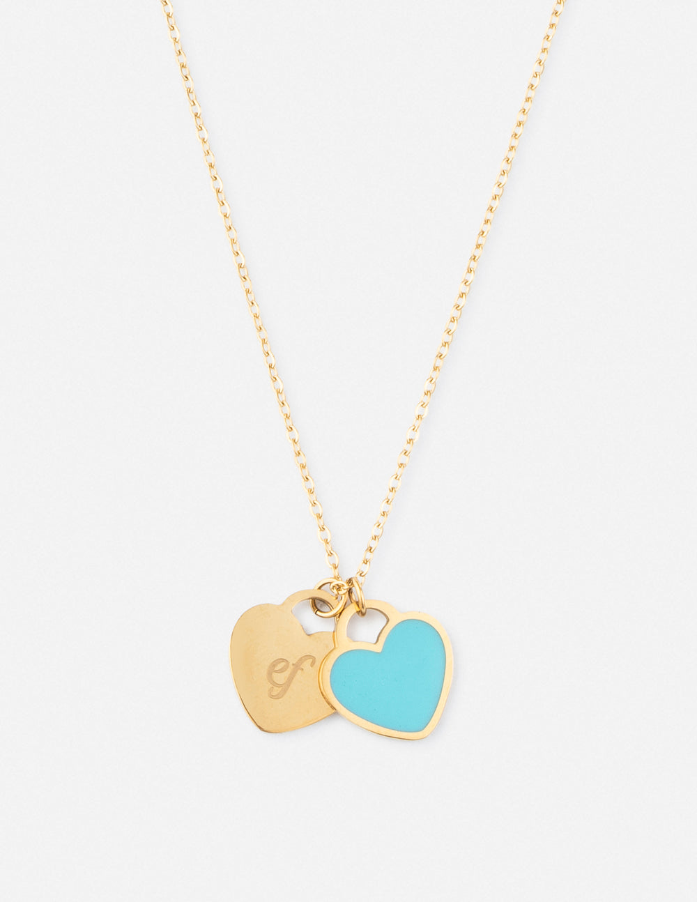 Gold chain necklace with blue enamel heart pendant and small engraved charm