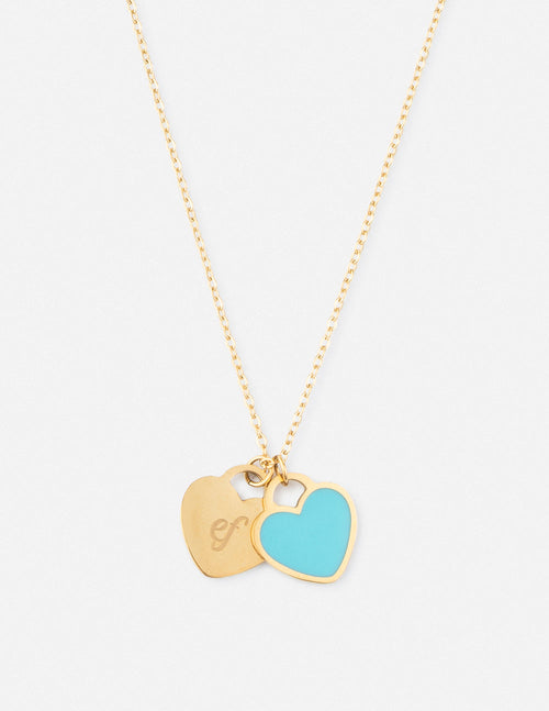 Gold chain necklace with blue enamel heart pendant and small engraved charm