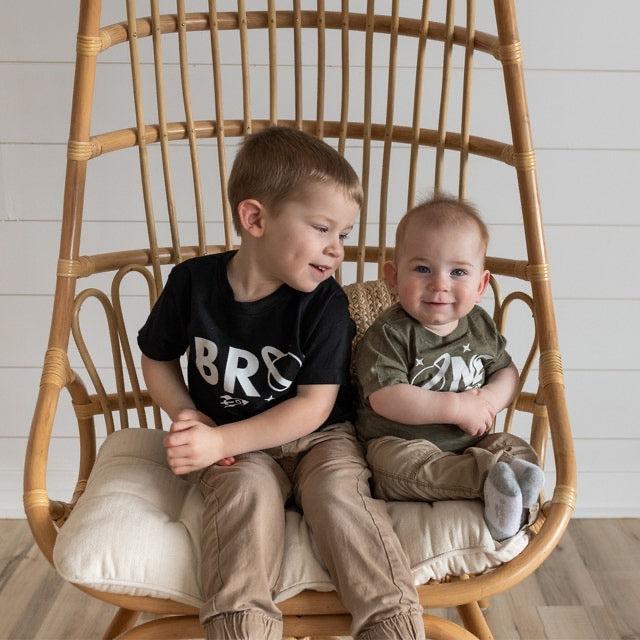 Baby and kids space-themed T-shirt set, black tee with white “BRO” graphic for two kids.