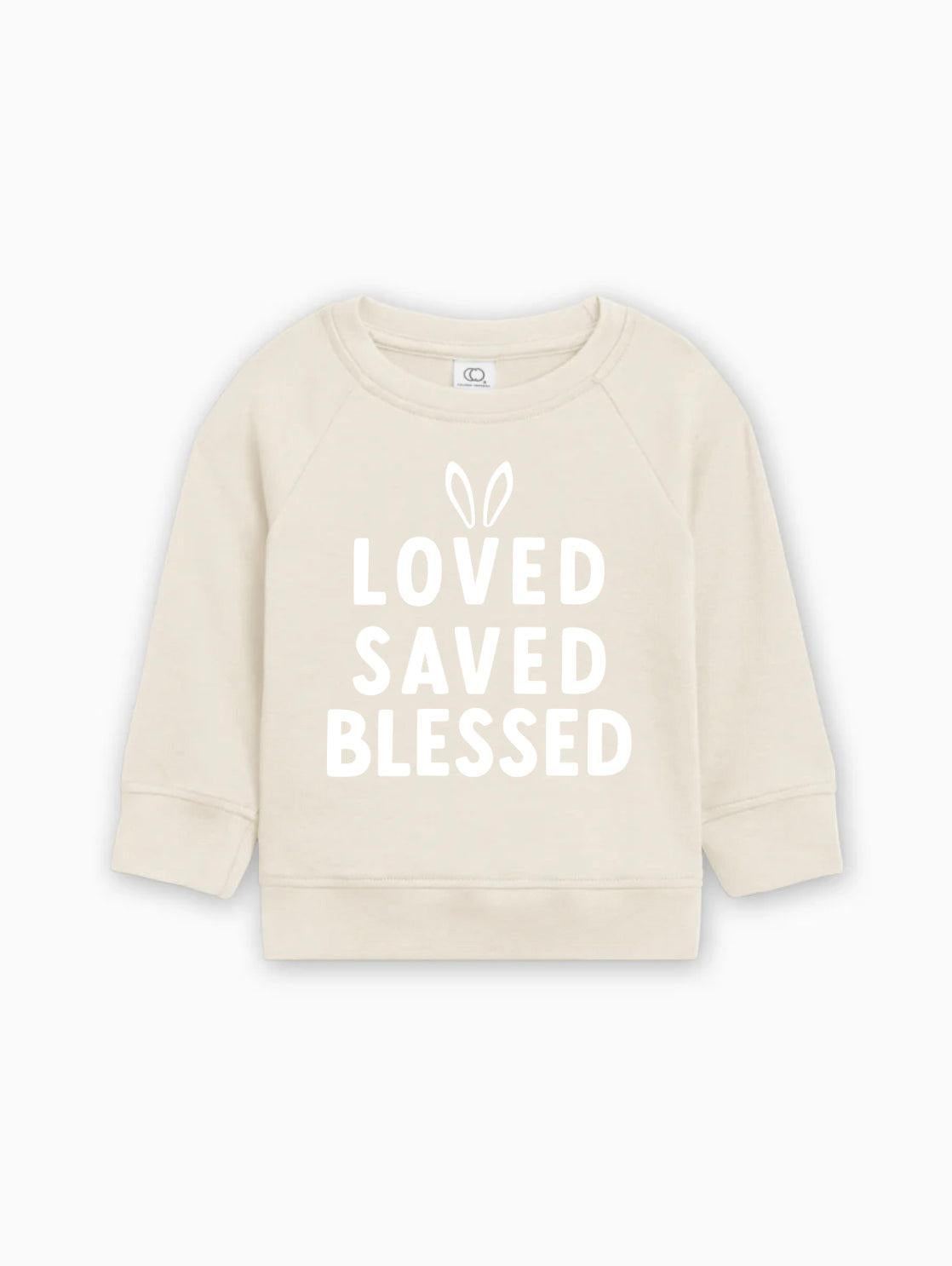 Cream baby pullover sweatshirt with 'LOVED SAVED BLESSED' bunny graphic