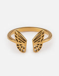 Gold butterfly ring with openwork wing details and smooth band, front view