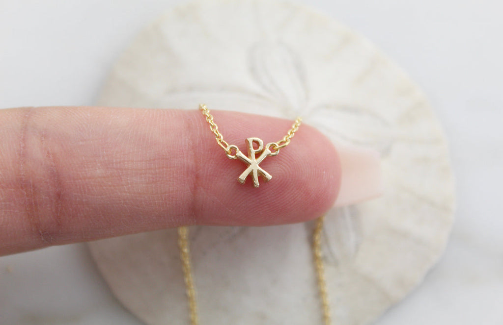 14K gold Chi Rho pendant necklace with small cross-style emblem