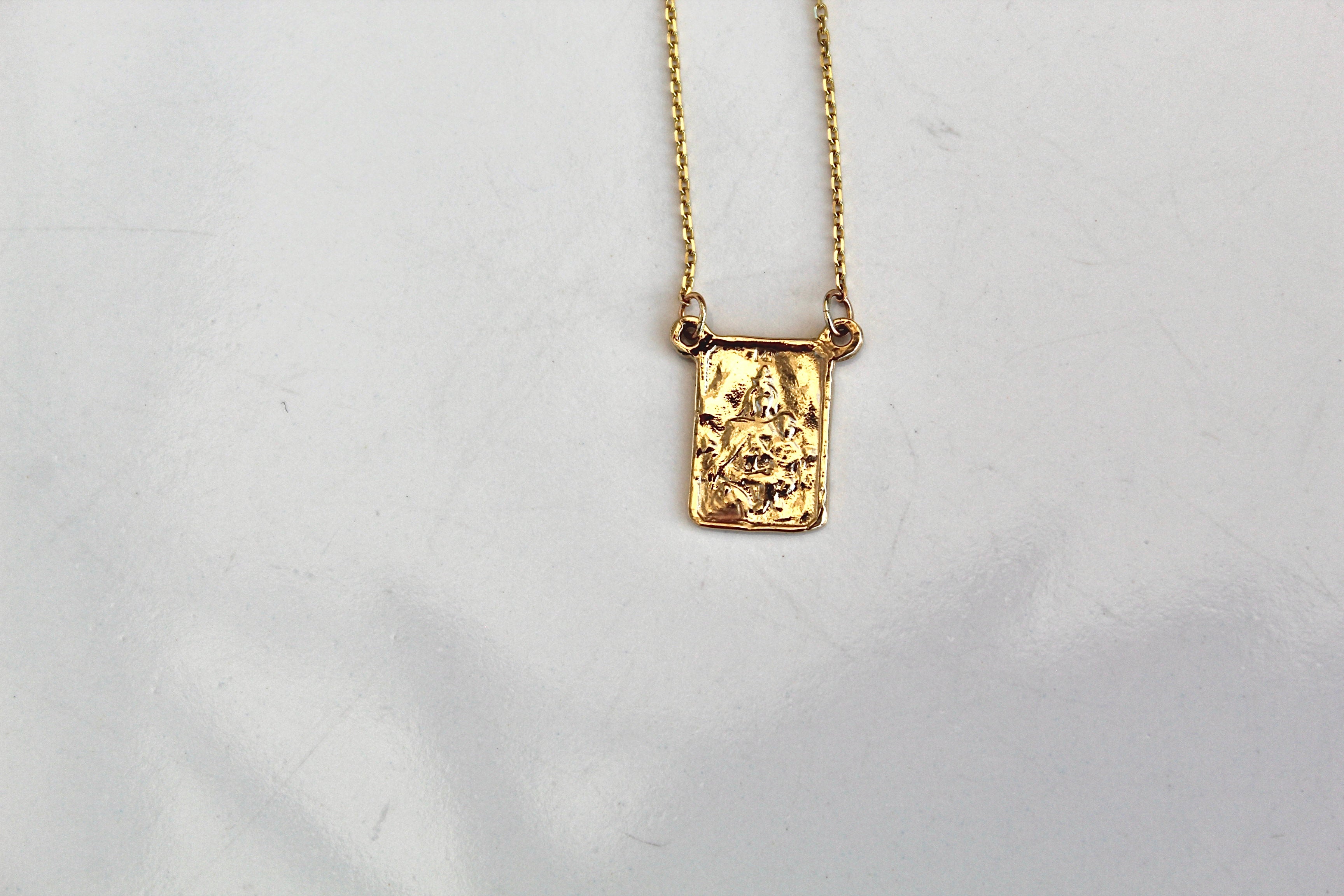 14K gold scapular pendant with ornate square front on a thin chain