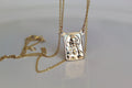 14K gold scapular necklace with square saint portrait pendant and glossy gold finish