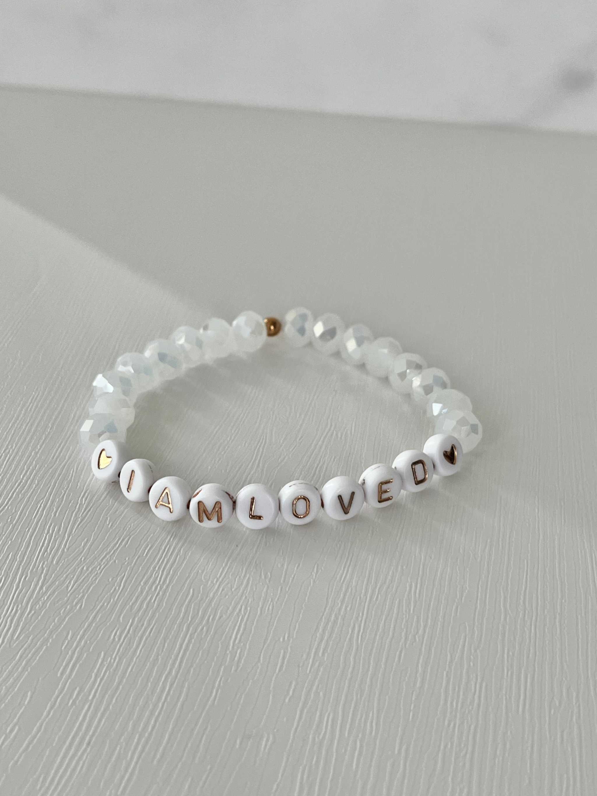 White beaded bracelet with crystal beads and 'I AM LOVED' letter beads