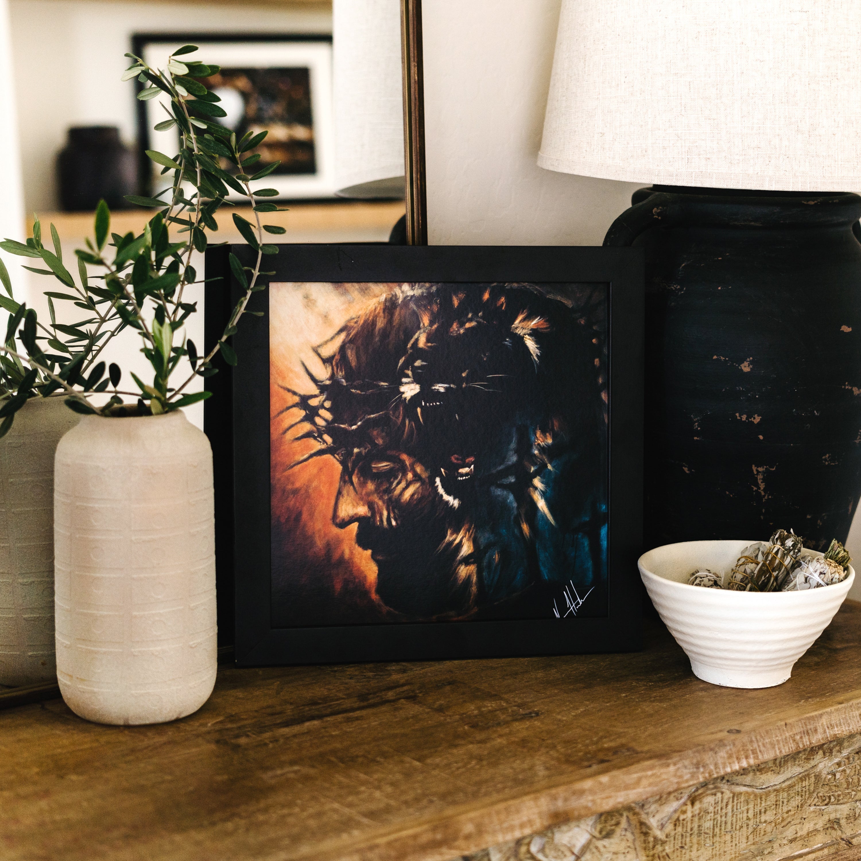 Framed lion head portrait art print with fiery orange background and dark mane