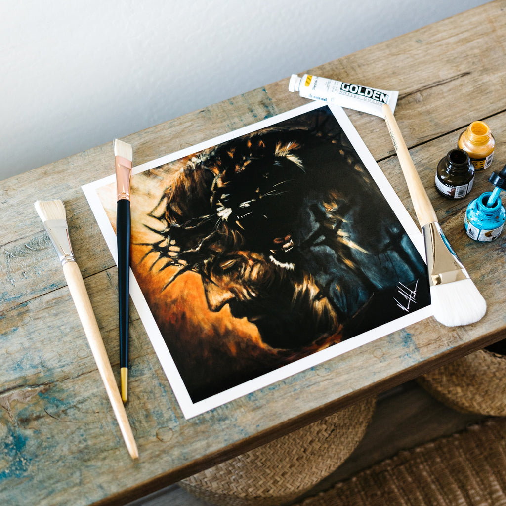Square lion portrait art print with dark mane and warm orange side glow, white frame