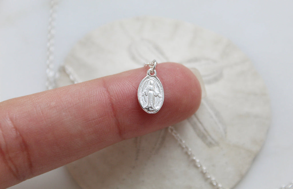 Silver-tone miraculous medal necklace pendant in 925 sterling silver, oval close-up