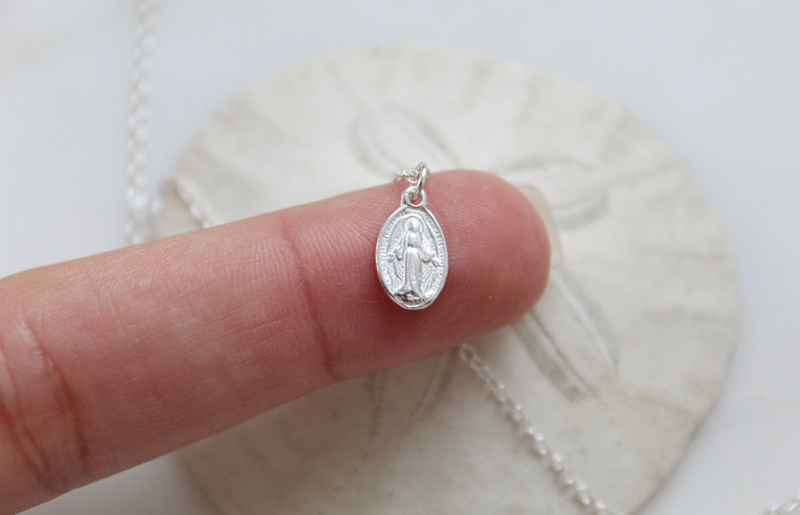 Silver-tone miraculous medal necklace pendant in 925 sterling silver, oval close-up