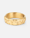 Gold-tone celestial-pattern band ring with engraved starburst and leaf details