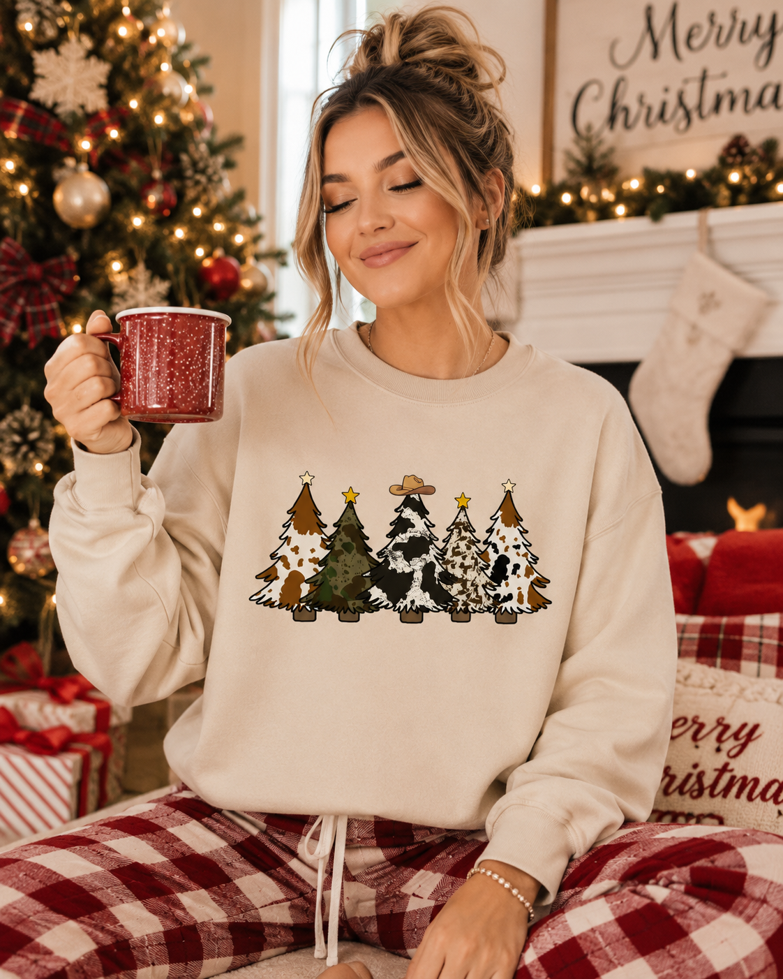 Light cream sweatshirt with front graphic of Christmas trees and stars