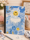 Blue composition book with Bible-themed doodles and “GOD LOVES” on the cover