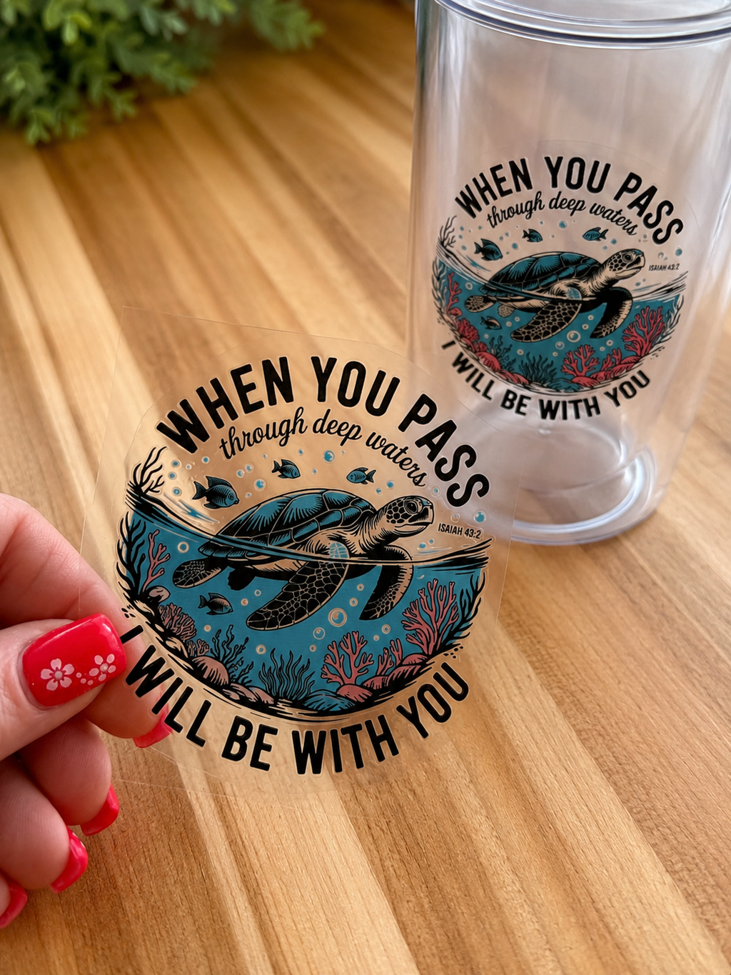 Sea turtle UV DTF decal with scripture text, teal ocean waves, black outline, on wood