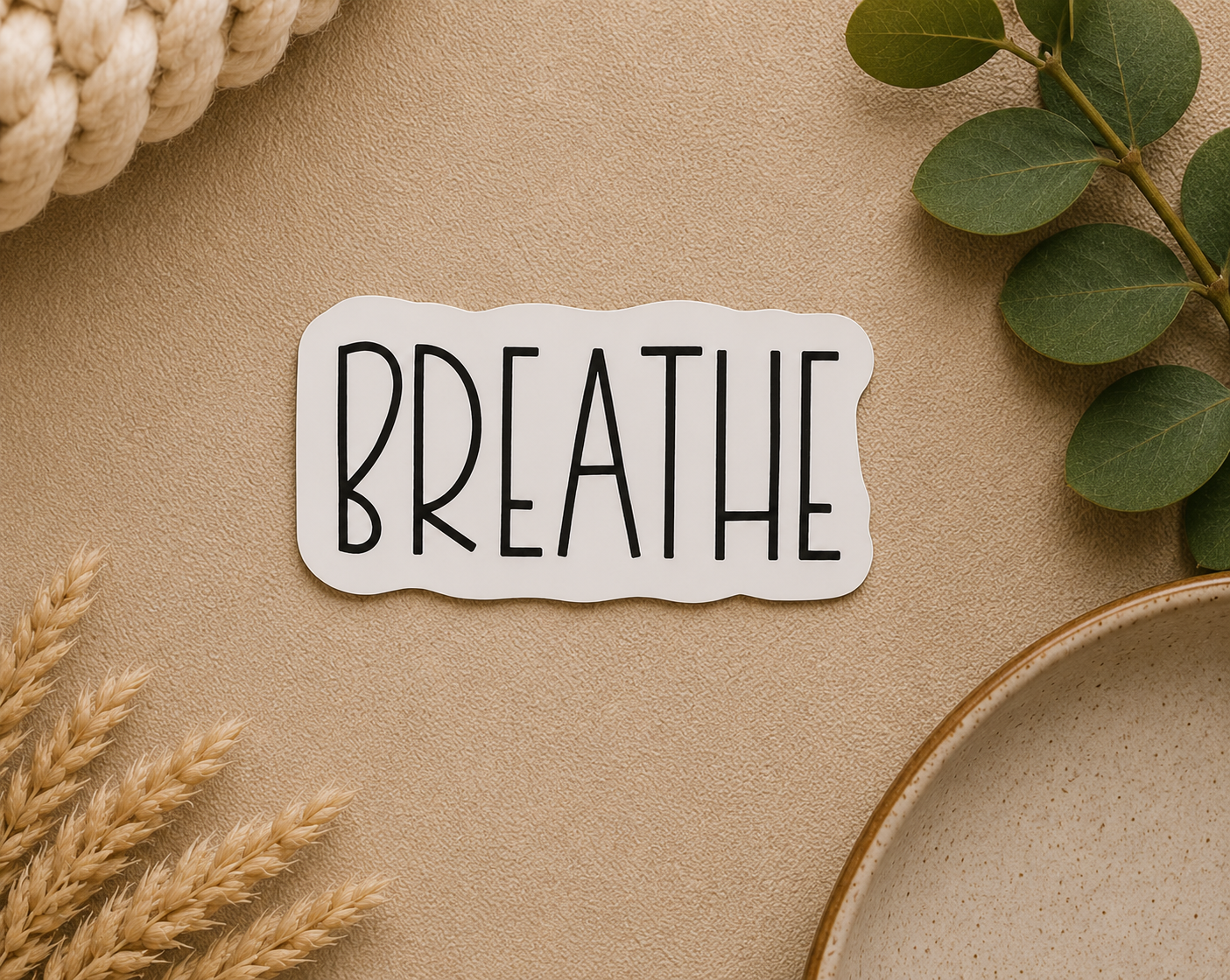 Breath sticker with black outlined word BREATHE on white backing