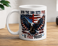White coffee mug with eagle-and-flag graphic and 'SON SETS FREE' text.