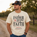 Cream graphic faith tee with 'Father Leads with Faith' and cross