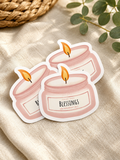 Blessings candle jar sticker with two pink wax candles and orange flames