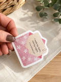 Pink envelope sticker with white flower pattern and faith quote, rounded corners