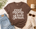 Brown graphic T-shirt with “Cool moms love Jesus” text in white