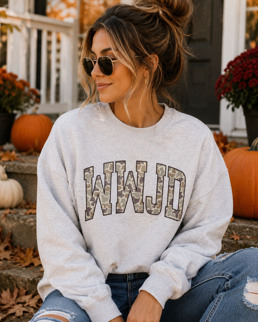 Gray crewneck sweatshirt with camo-style WWJD graphic, long sleeves