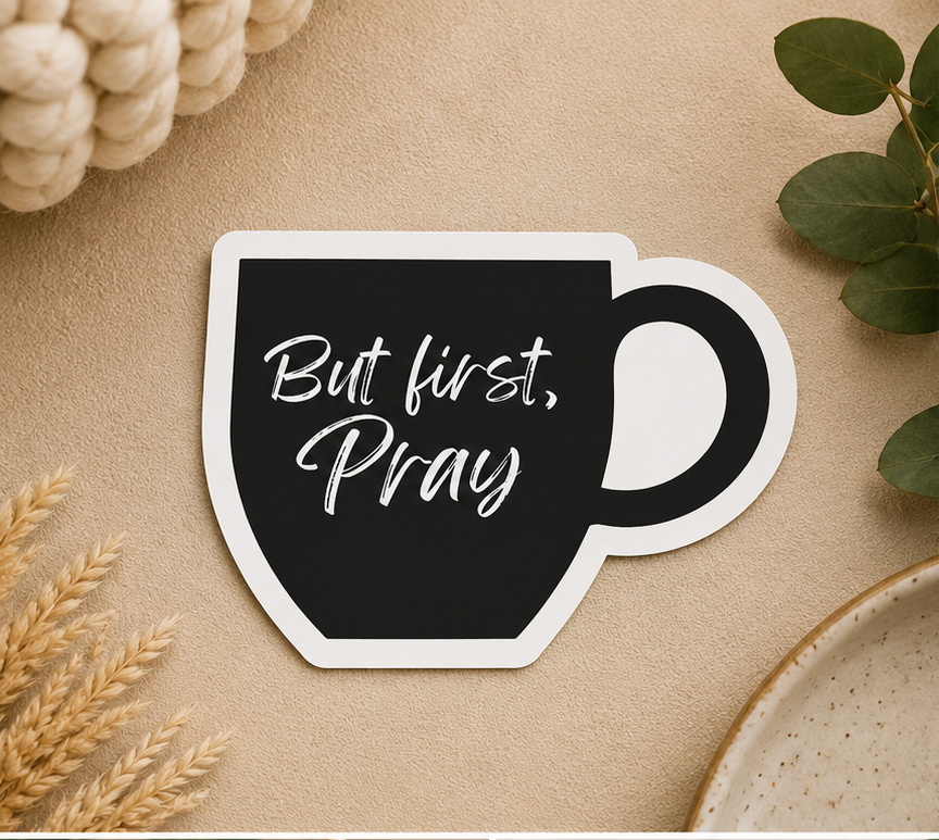 Prayer sticker of black coffee mug with white script 'But first, Pray'