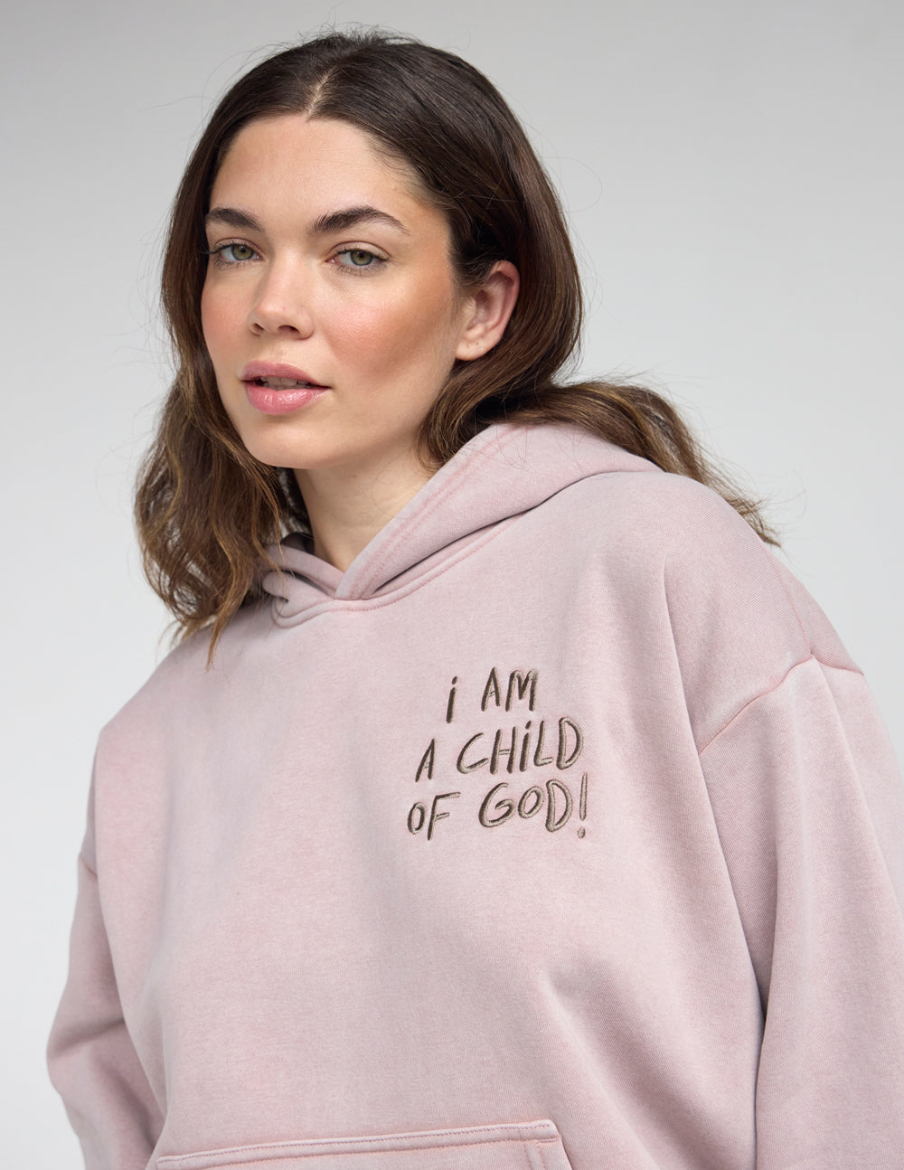Mauve unisex hoodie with front graphic print and drawstring hood