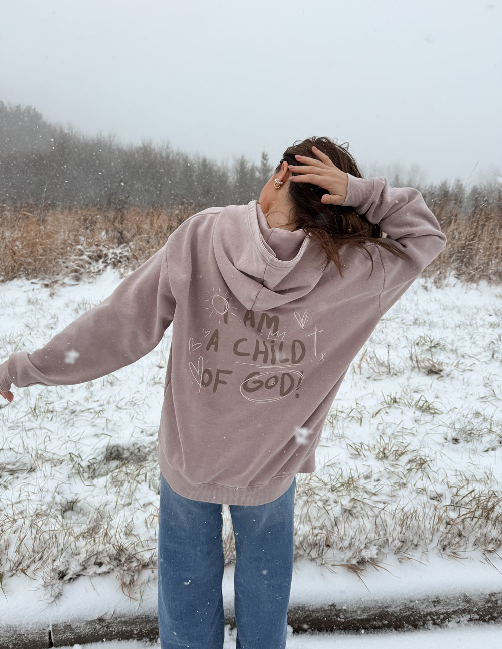 Mauve unisex hoodie with hood up and front graphic print