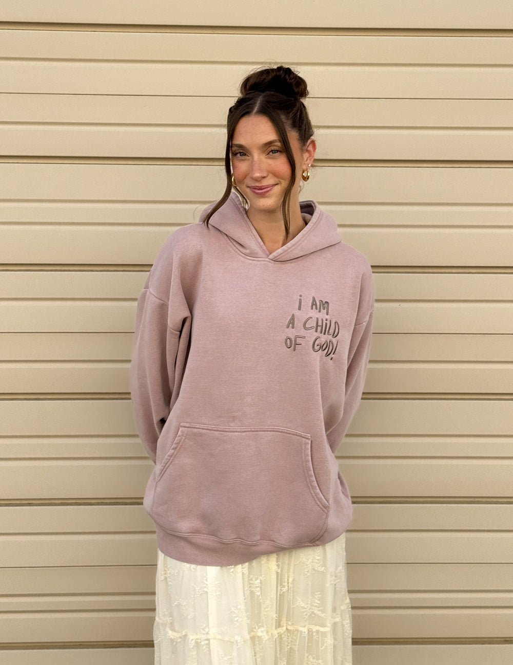 Lavender unisex hoodie with front kangaroo pocket and chest graphic text