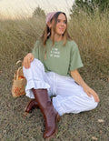 Green cropped women’s tee with short sleeves and “I AM A CHILD OF GOD!” front text