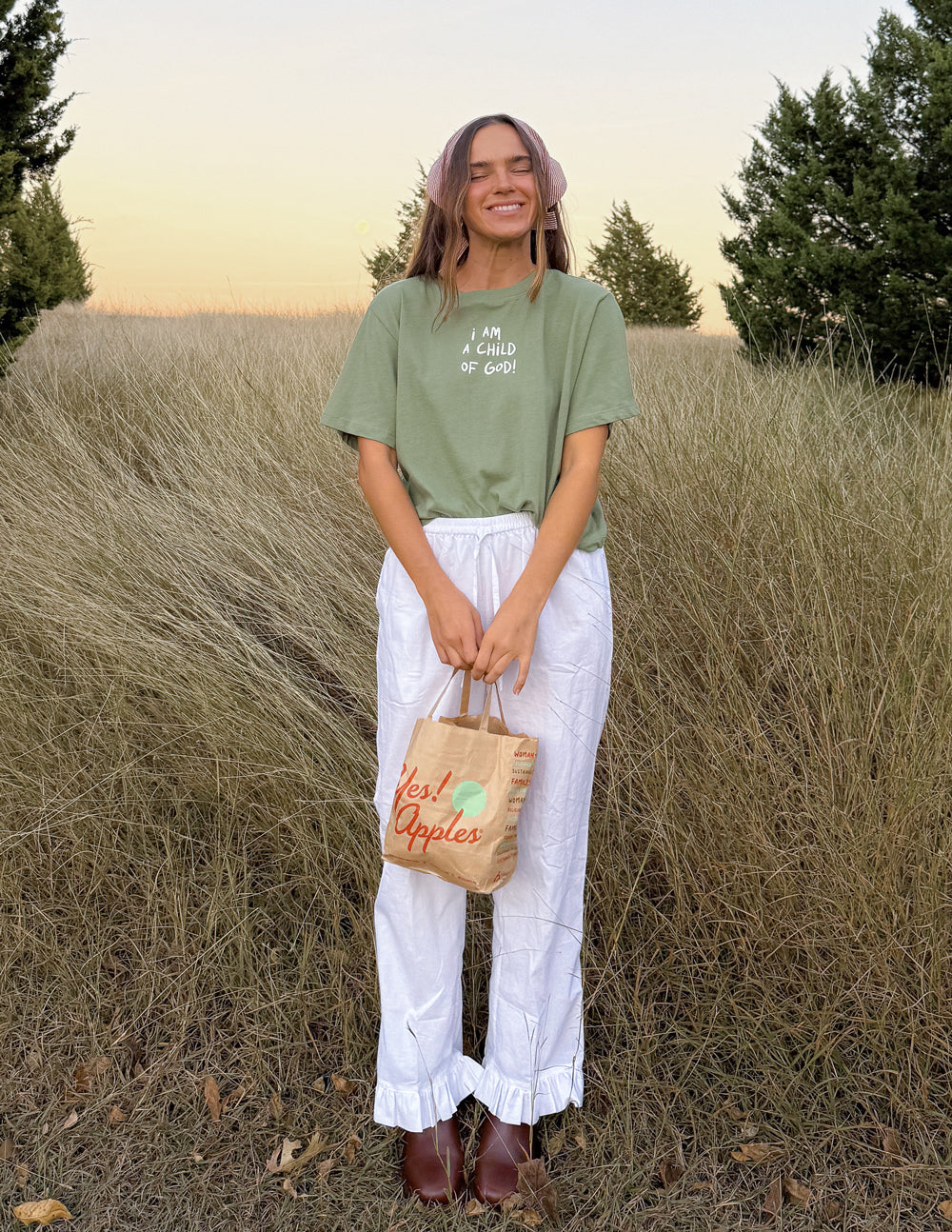 Green cropped women’s tee with “I AM A CHILD OF GOD!” printed chest wording
